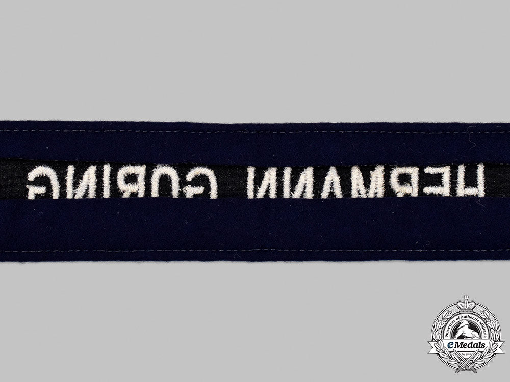 germany,_luftwaffe._a_mint_and_unissued1_st_fallschirm-_panzer_division_hermann_göring_em/_nco’s_cuff_title_008_m21_mnc9167