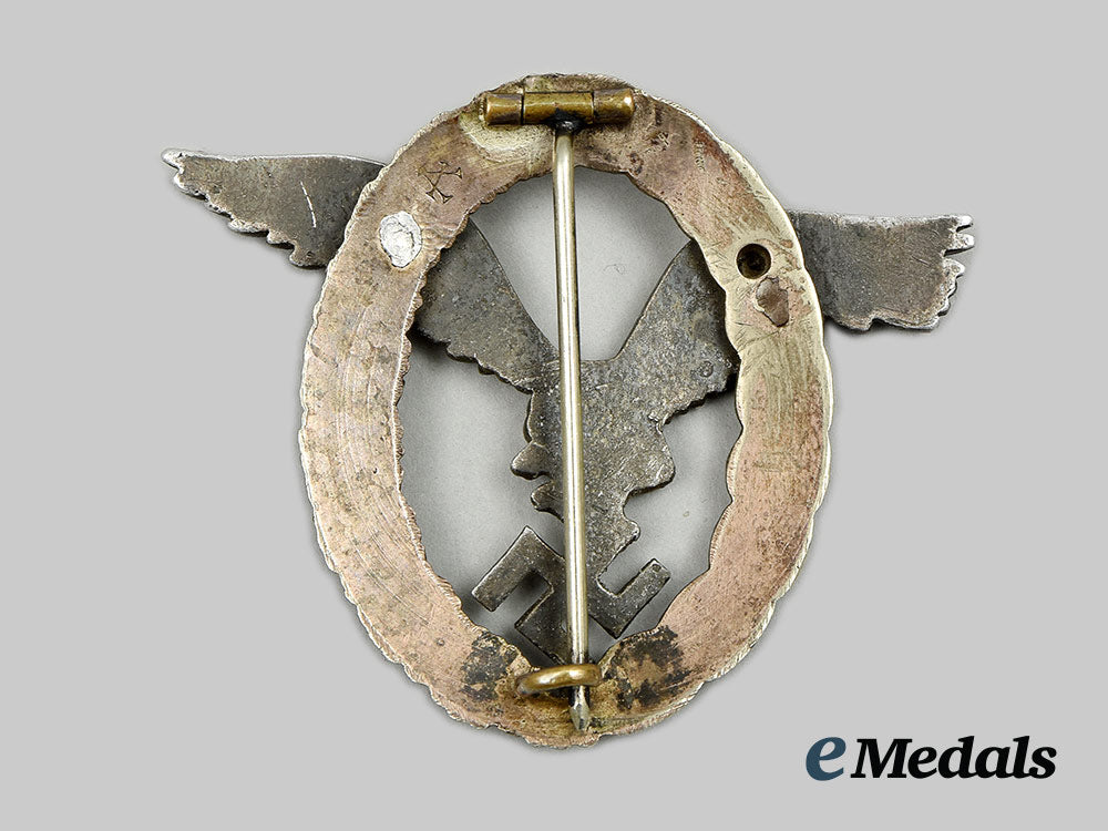 germany,_luftwaffe._a_rare_pilot’s_badge,_thin_wreath_aluminum_eagle_version,_by_f.w._assmann&_söhne_026_ai1_9553_1_1