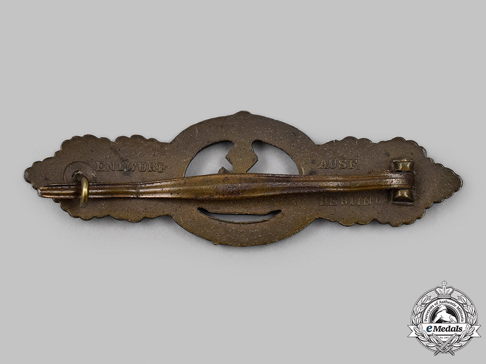 germany,_kriegsmarine._a_u-_boat_clasp,_second_pattern_bronze_grade,_by_schwerin_04_m21_mnc0643_1_1