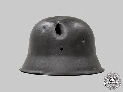 germany,_heer._a_battle-_damaged_m42_stahlhelm_052_m21_mnc9371-copy_1