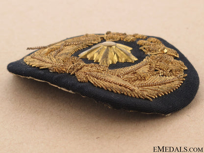 wwii_navy_officer’s_cap_badge_11.jpg504f8a3932e35