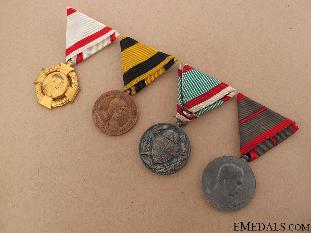 lot_of_four_medals_12.jpg5088324f8bb93