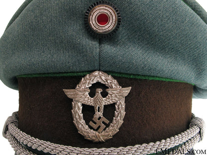 reich_protection_police_officer's_visor_cap_13.jpg51939bf479007