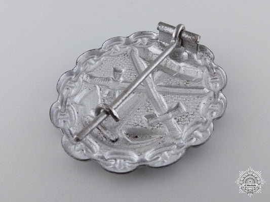 a_first_war_naval_wound_badge;_silver_grade_16.jpg547c7f2627c25