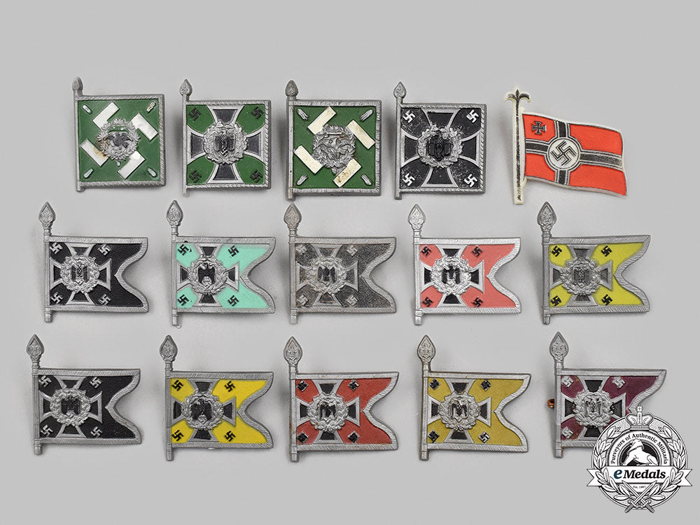 germany,_third_reich._a_lot_of_winterhilfswerk_wehrmacht_standard_donation_badges_18_m21_mnc6565