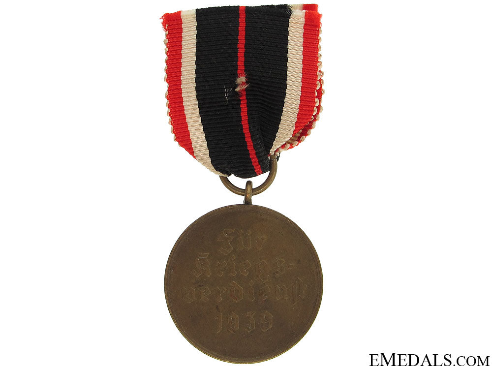 a_german_wehrpass,_award_document&_medal_205.jpg51978bff411f3