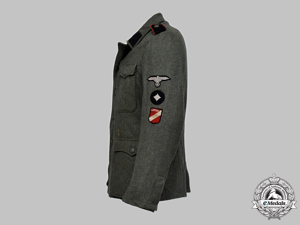 germany,_ss._a_rare15_th_waffen_grenadier_division_of_the_ss(1_st_latvian)_flak/_artillery_volunteer’s_tunic_21_m21_mnc2785_1_1