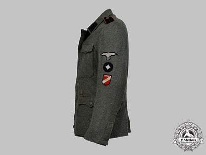 germany,_ss._a_rare15_th_waffen_grenadier_division_of_the_ss(1_st_latvian)_flak/_artillery_volunteer’s_tunic_21_m21_mnc2785_1_1