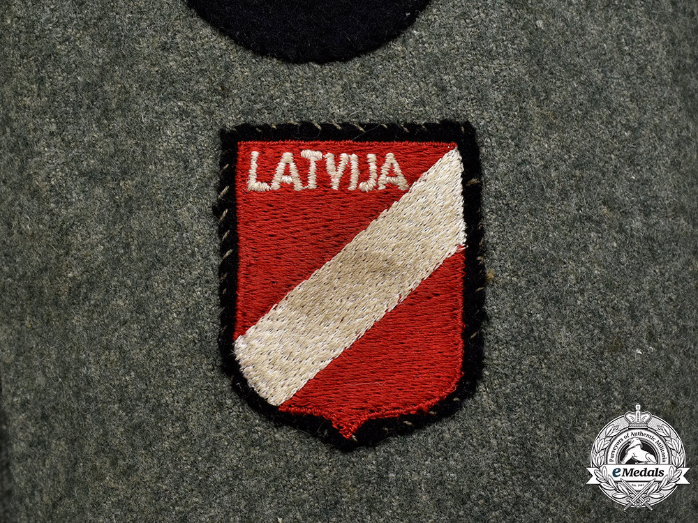 germany,_ss._a_rare15_th_waffen_grenadier_division_of_the_ss(1_st_latvian)_flak/_artillery_volunteer’s_tunic_24_m21_mnc2788_1_1