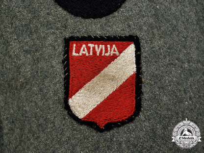 germany,_ss._a_rare15_th_waffen_grenadier_division_of_the_ss(1_st_latvian)_flak/_artillery_volunteer’s_tunic_24_m21_mnc2788_1_1