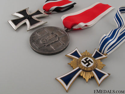 three_wwii_german_medals&_awards_26.jpg5239db17911d6