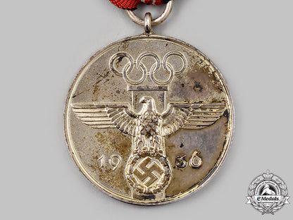 germany,_third_reich._a_german_olympic_games_commemorative_medal,_with_case_302_m21_mnc0414
