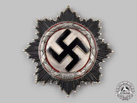 germany,_wehrmacht._a_german_cross_in_silver,_by_deschler&_sohn_31_m21_mnc2884