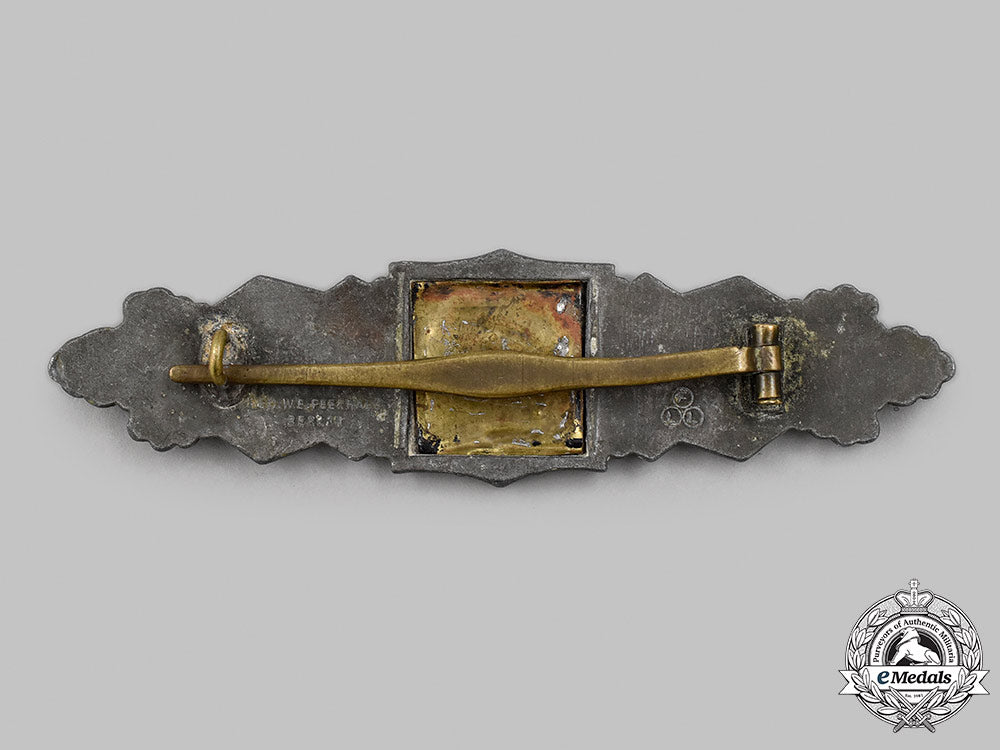 germany,_wehrmacht._a_close_combat_clasp,_bronze_grade,_by_friedrich_linden_35_m21_mnc2996_1_1