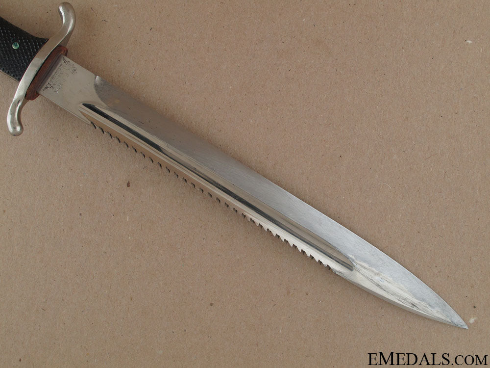 fireman's_sawback_bayonet_by_fack&_sohne_38.jpg522e21beb54f1