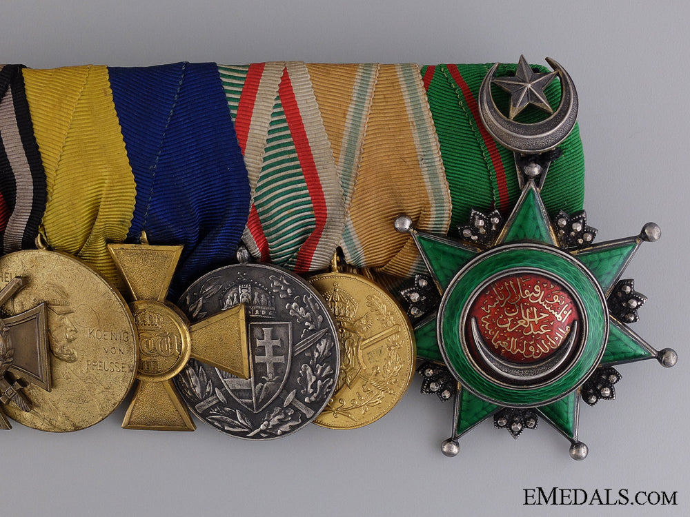 a_first_war_imperial_medal_bar_with_turkish_order_of_osmania_3.jpg53f75bb50666b