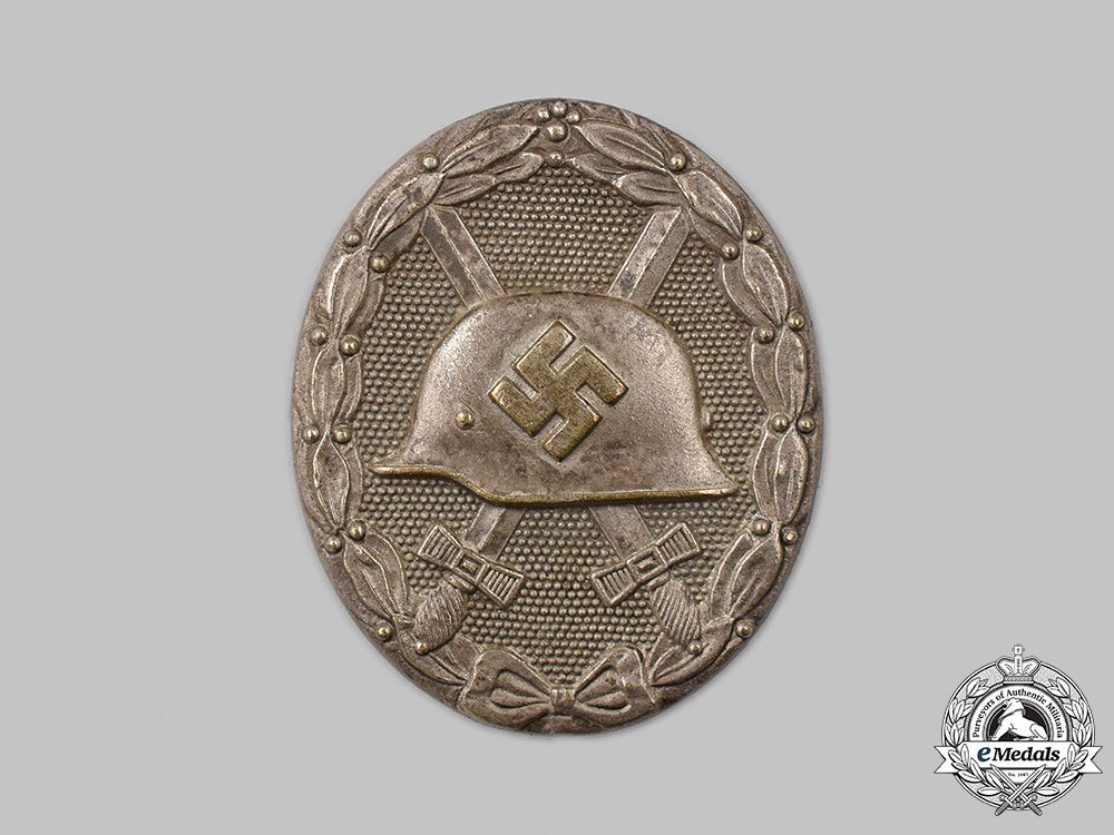 germany,_wehrmacht._a_wound_badge,_silver_grade,_by_klein&_quenzer_41_m21_mnc1005