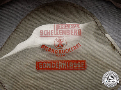germany,_heer._a_rare_smoke/_chemical_troops_officer’s_visor_cap,_by_schellenberg_43_m21_mnc6079_1