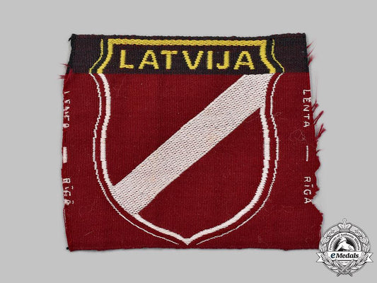 germany,_wehrmacht._a_latvian_volunteer’s_sleeve_shield,_by_lenta_46_m21_mnc1010
