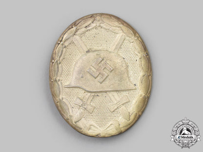 germany,_wehrmacht._a_wound_badge,_silver_grade,_by_hermann_wernstein_49_m21_mnc4617