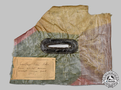 germany,_luftstreitkräfte._a_cut-_off_section_of_camouflage_cloth_from_a_downed_german_plane,_somme,_c.1918_51_m21_mnc7921