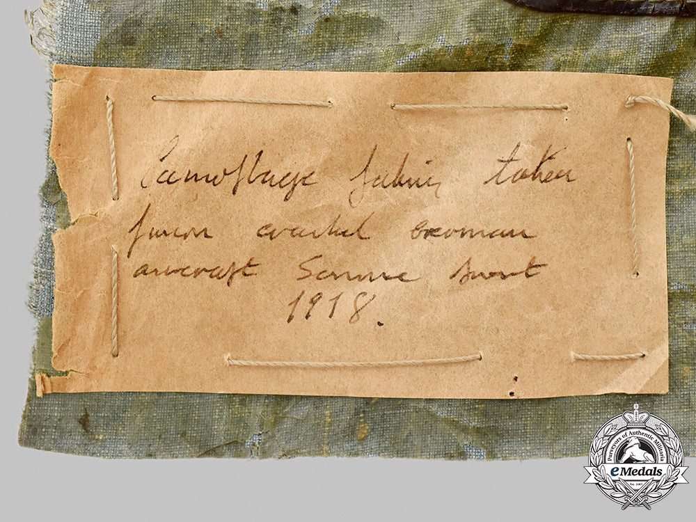 germany,_luftstreitkräfte._a_cut-_off_section_of_camouflage_cloth_from_a_downed_german_plane,_somme,_c.1918_52_m21_mnc7923