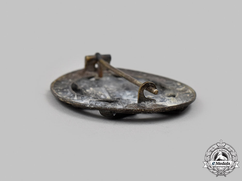 germany,_wehrmacht._a_pair_of_service_badges_56_m21_mnc6635