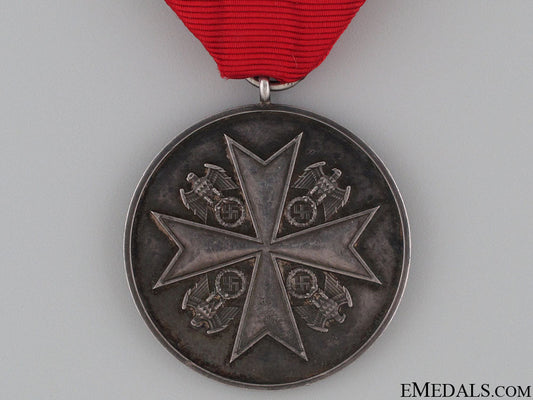 merit_medal_of_the_german_eagle_order_6.jpg5234744ed3ab7