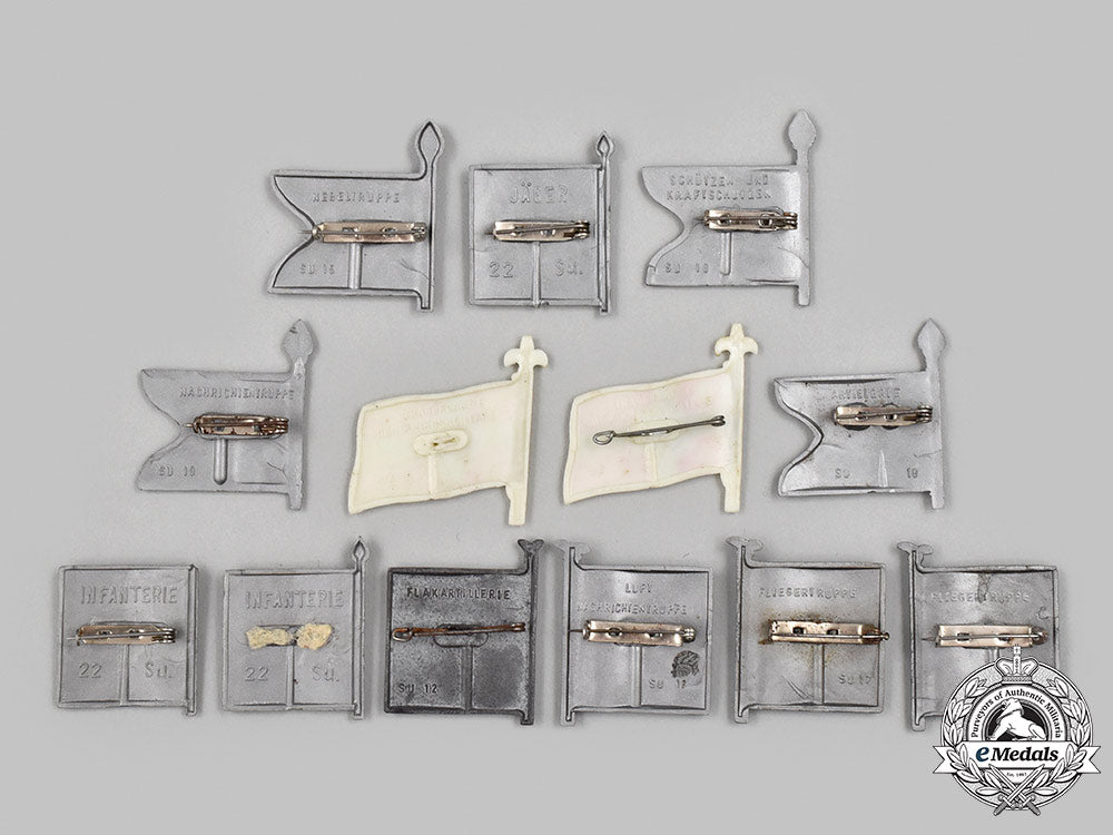 germany,_third_reich._a_lot_of_winterhilfswerk_wehrmacht_standard_donation_badges_77_m21_mnc7501