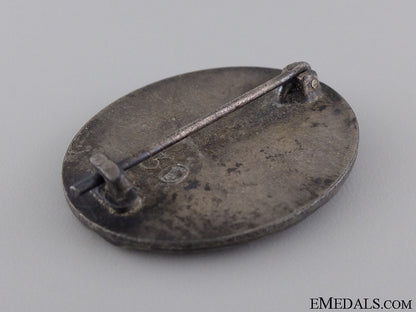 a_wwii_wound_badge;_silver_grade_by_hauptmünzamt_7.jpg543e9e4771f16