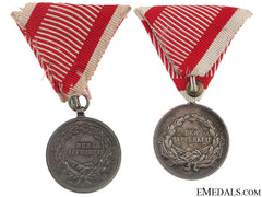 Two Silver Bravery Medals