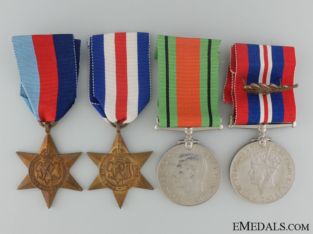 wwii_british_group_of_four_medals_with_shipping_container_8.jpg535bec895818e