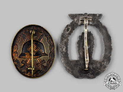 germany,_wehrmacht._a_pair_of_service_badges_96_m21_mnc7534