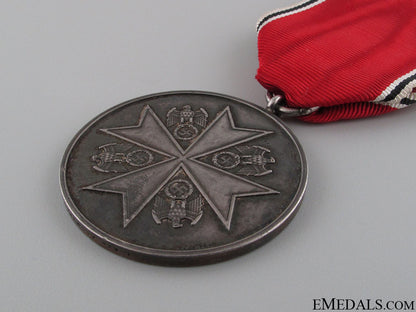 merit_medal_of_the_german_eagle_order_9.jpg5234745cd536f