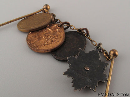 wwi_veteran's_four_miniature_medals_on_chain_9.jpg5245be3456766