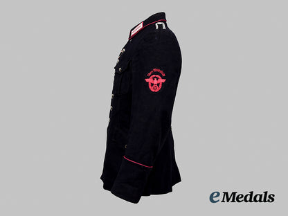 germany,_fire_protection_police._a_feuerschutzpolizei_feuerwehrmann_of_ober-_wöllstadt_service_tunic__a_i1_0111