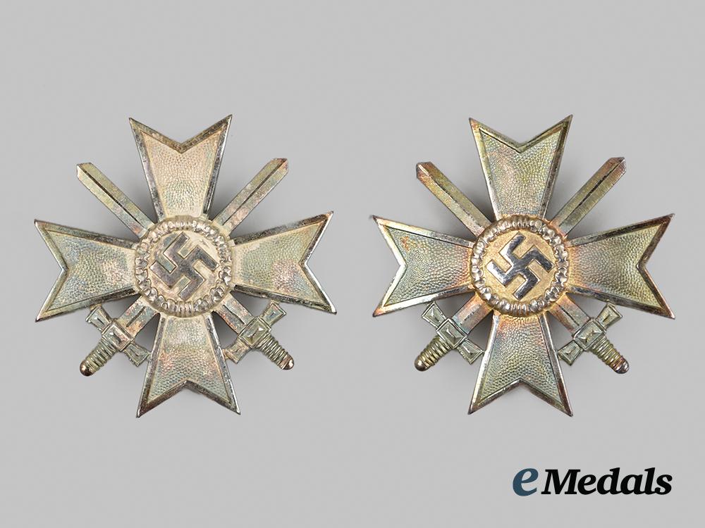 germany,_third_reich._two_unissued_war_merit_crosses_first_class_with_wrapping_paper__a_i1_0391