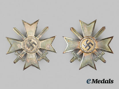 germany,_third_reich._two_unissued_war_merit_crosses_first_class_with_wrapping_paper__a_i1_0391