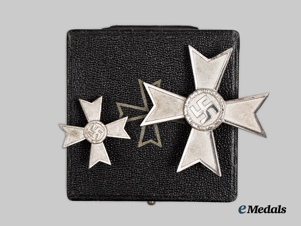 germany,_third_reich._a_cased_war_merit_cross_first_class_by_friedrich_orth_with_half-_miniature_by_wilhelm_deumer__a_i1_0657