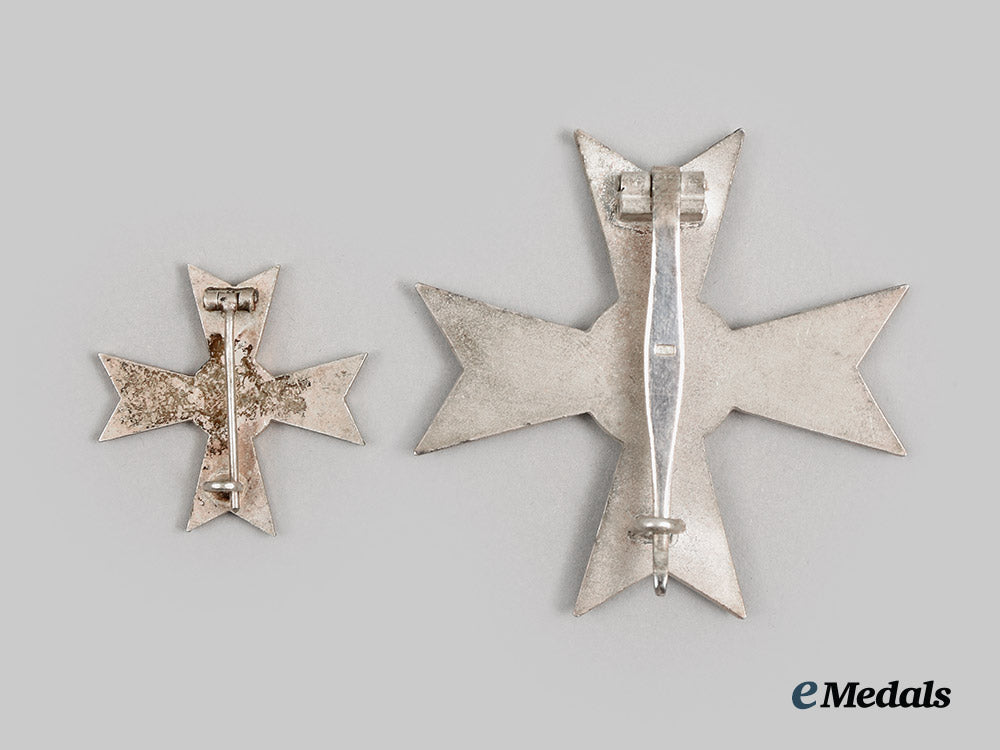 germany,_third_reich._a_cased_war_merit_cross_first_class_by_friedrich_orth_with_half-_miniature_by_wilhelm_deumer__a_i1_0661