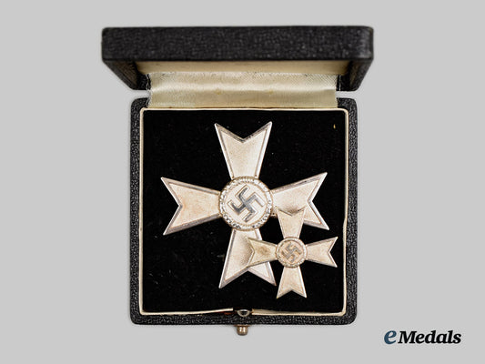 germany,_third_reich._a_cased_war_merit_cross_first_class_by_friedrich_orth_with_half-_miniature_by_wilhelm_deumer__a_i1_0666