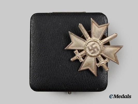 germany,_wehrmacht._a_war_merit_cross_i_class_with_swords_and_case,_screwback_version,_by_c._e._juncker__a_i1_1268