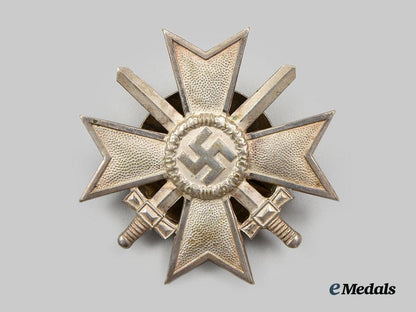 germany,_wehrmacht._a_war_merit_cross_i_class_with_swords_and_case,_screwback_version,_by_c._e._juncker__a_i1_1269