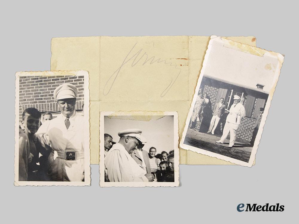 germany,_third_reich._a_signature_and_lot_of_three_photographs_of_hermann_göring_visiting_a_youth_hostel_on_the_island_of_sylt__a_i1_1392