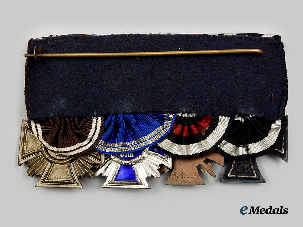 germany,_third_reich._a_medal_bar_for_first_world_war_and_n_s_d_a_p_long_service__a_i1_2473