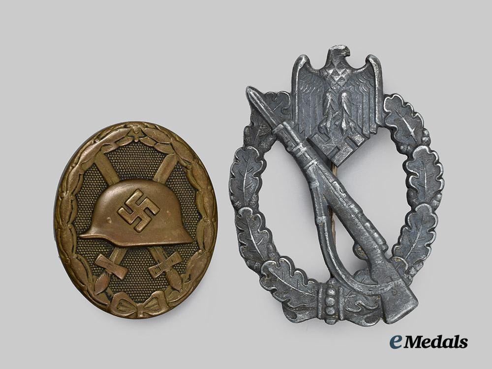 germany,_wehrmacht._a_pair_of_service_badges__a_i1_4254