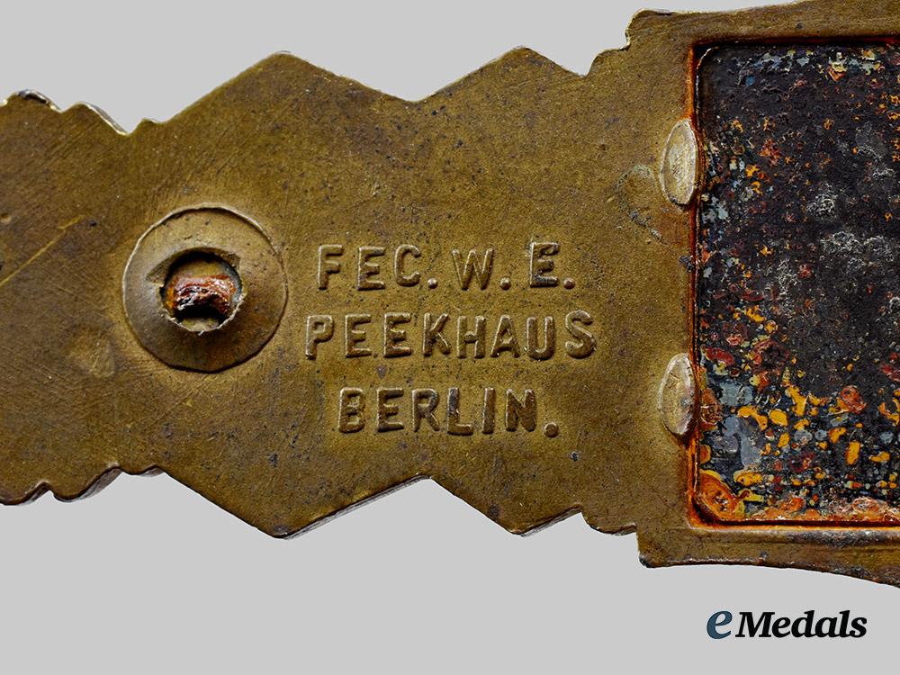 germany,_wehrmacht._a_close_combat_clasp,_bronze_grade,_by_arbeitsgemeinschaft_metall_und_kunststoff__a_i1_4860