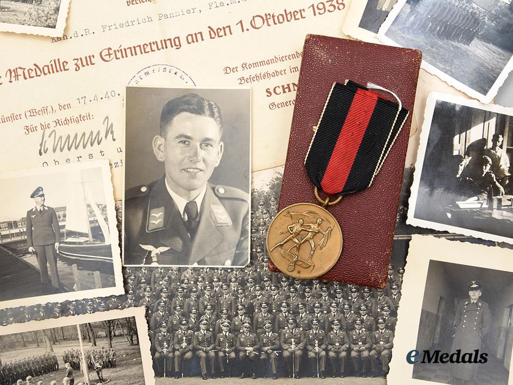 germany,_luftwaffe._a_sudetenland_medal,_with_case,_award_documents,_and_photographs_to_kanonier_friedrich_pannier__a_i1_6144