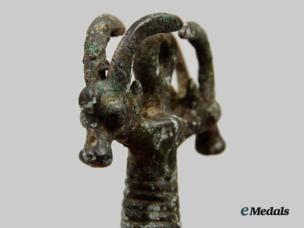 iran,_lorestan_province._a10th_century_b_c_double_headed_goat_pendant_gifted_to_buzz_aldrin__a_i1_8470
