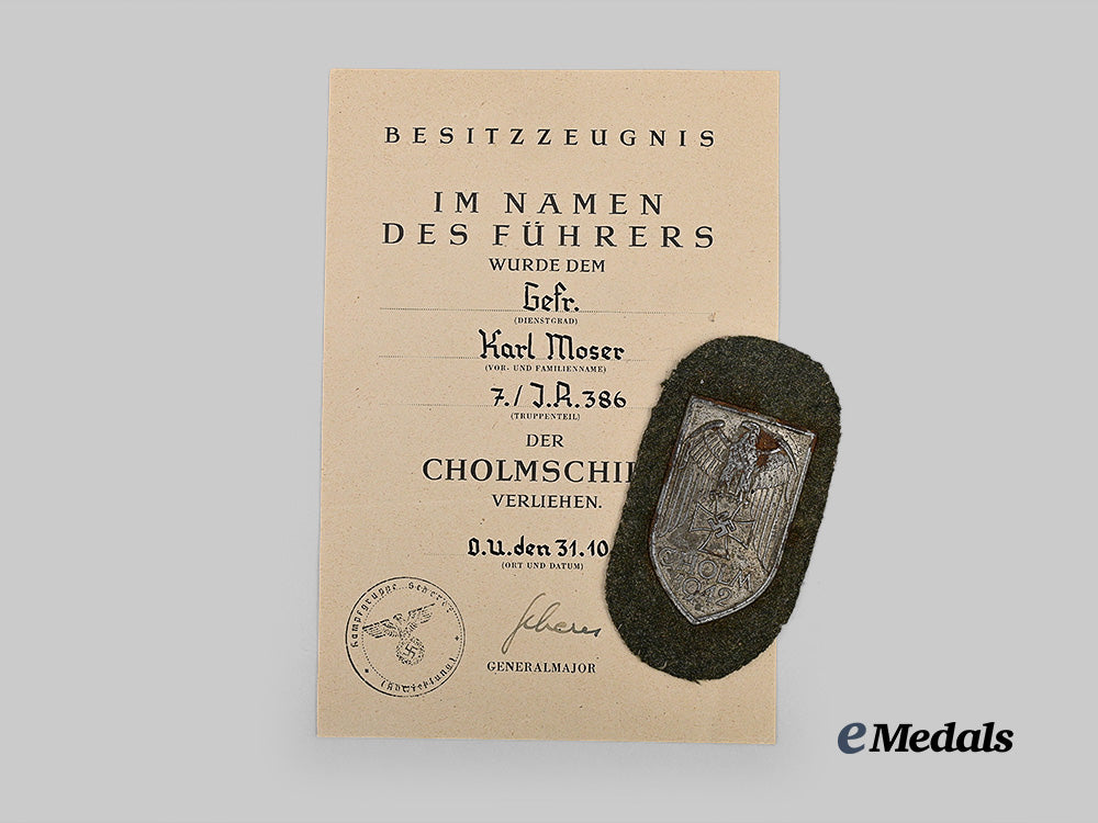 germany,_heer._a_rare_cholm_shield,_with_award_document,_to_gefreiter_karl_moser_e_medals__g62779_2
